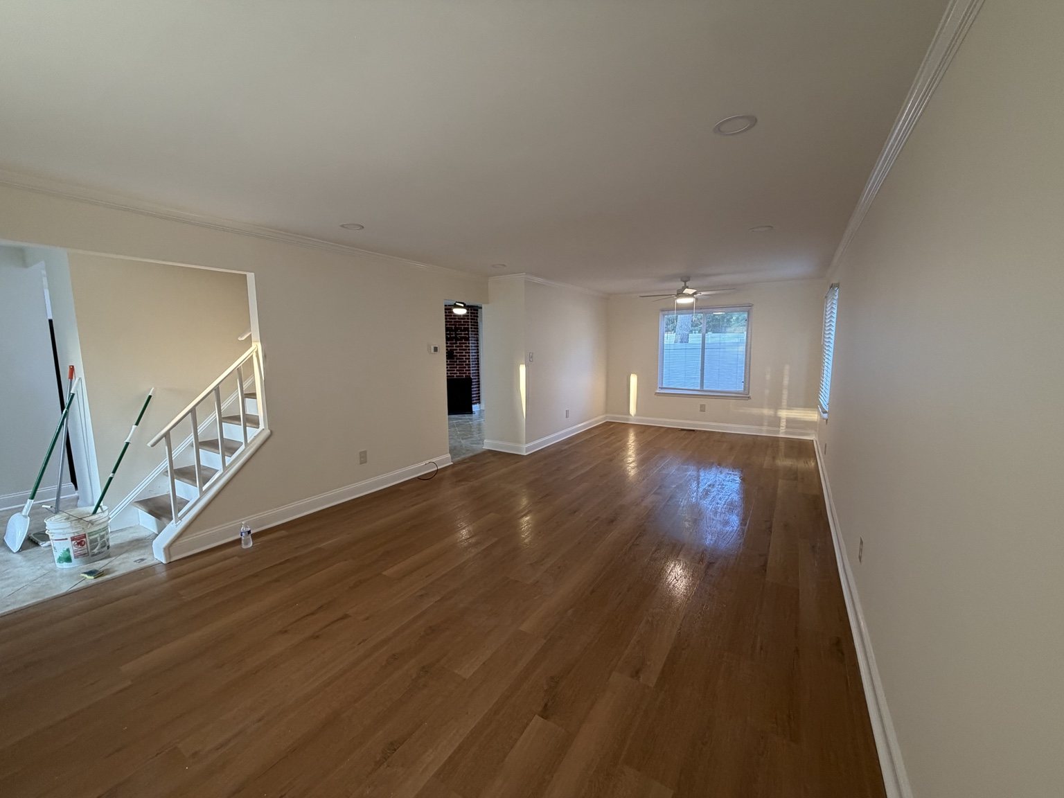 Finished living room renovation with hardwood floors